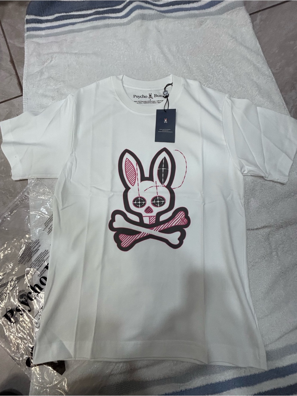 Psycho Bunny White Tee with Pink & Black Bunny Skull Graphic